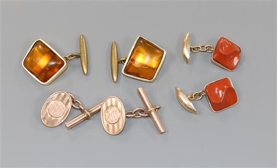 A pair of 14k gold and jasper cufflinks, a pair of 9ct gold and amber cufflinks and one other pair of 9ct gold cufflinks.